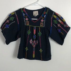 Girls embroidered shirt.